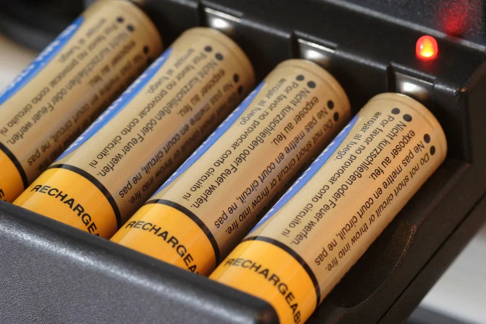 four yellow batteries