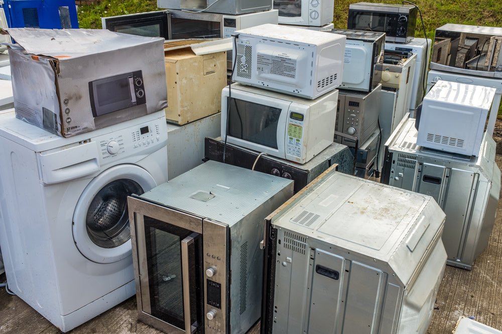 Large and small appliances being recycled - by Pale Blue Earth