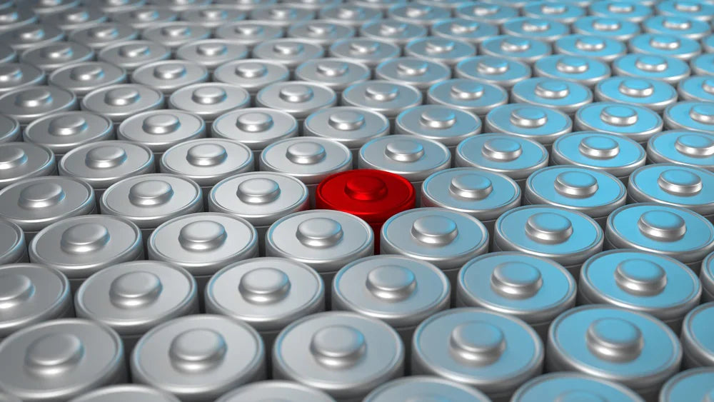 Red battery among metallic batteries