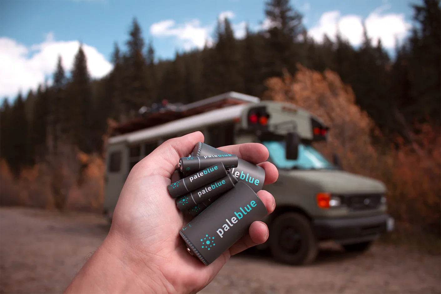 Holding Pale Blue Batteries