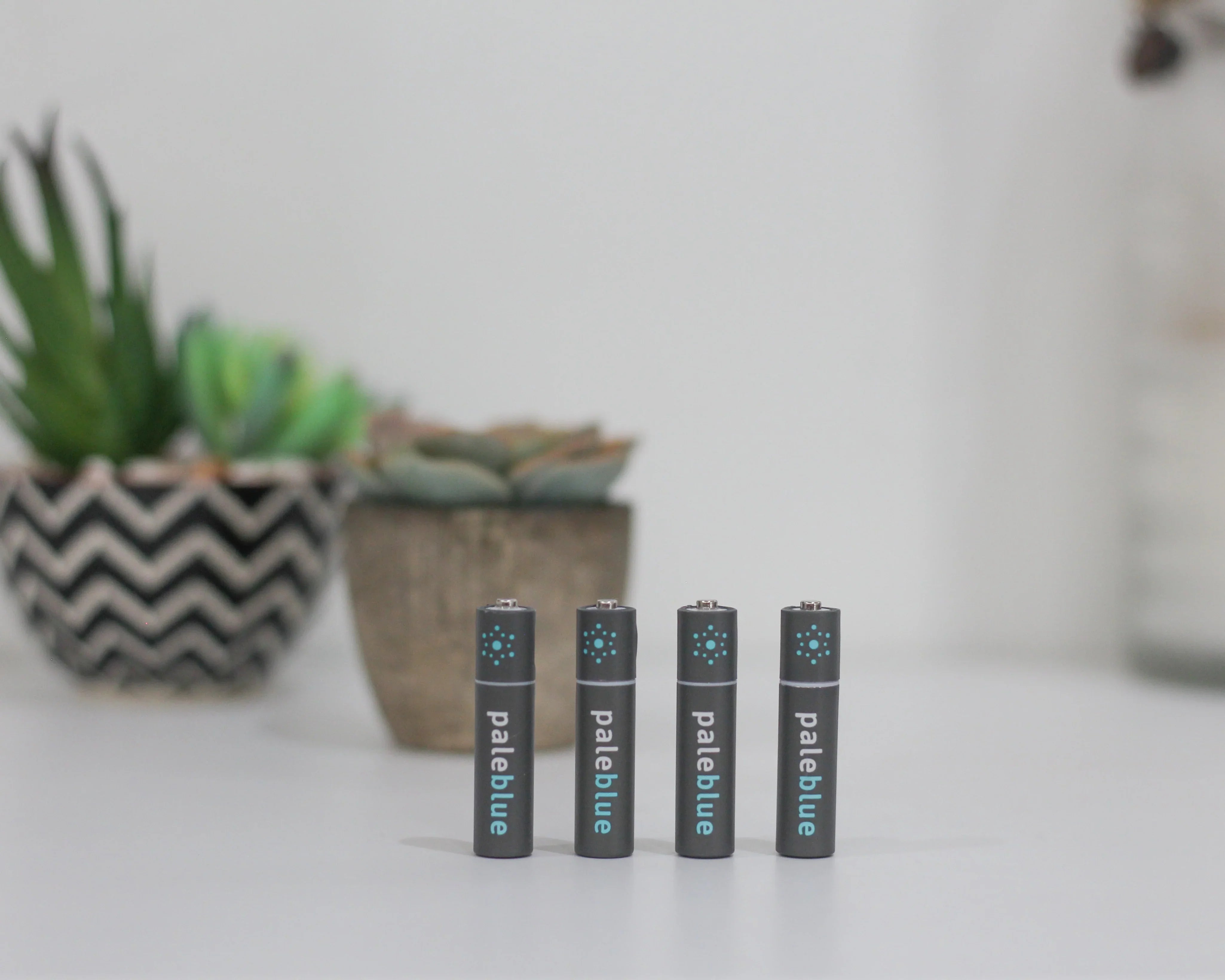Four paleblue batteries