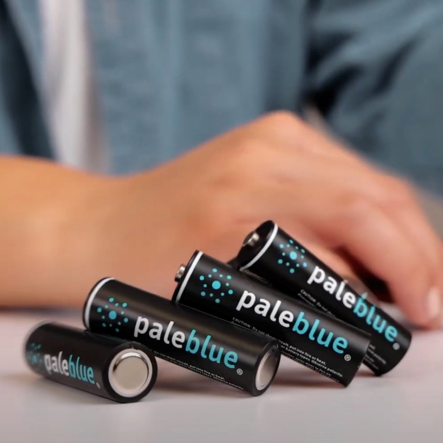 A video thumbnail of four Paleblue AA batteries being plugged in