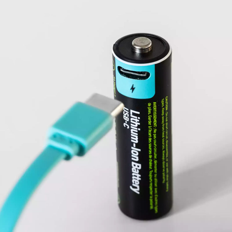 A Paleblue lithium-ion USB-C battery with a turquoise blue connector, shown standing upright next to a matching turquoise USB-C cable on a light gray background.
